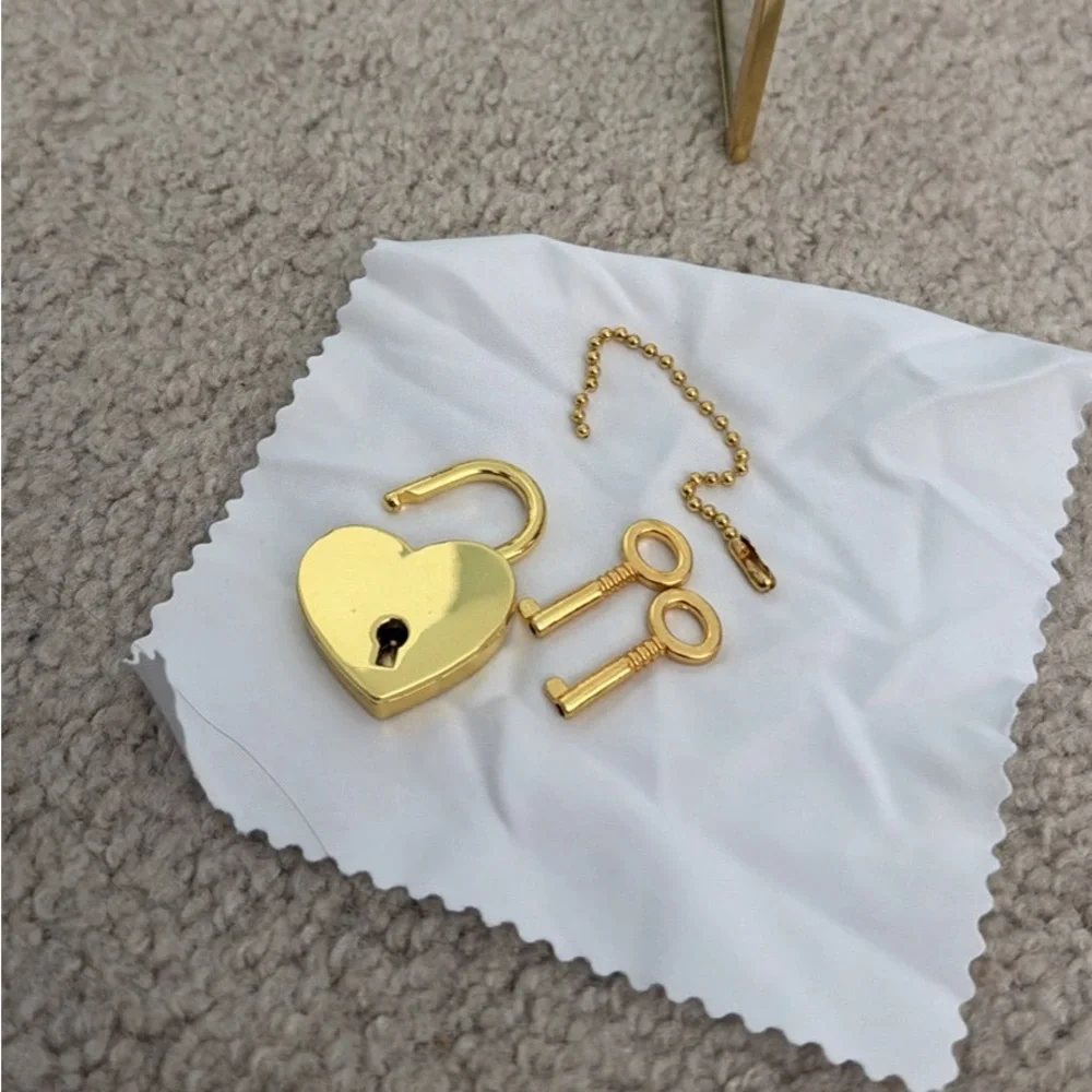 Gold card box holder with heart lock and key